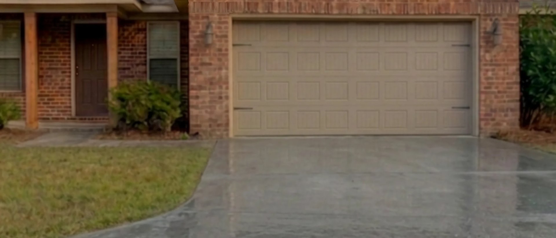 Before - Dirty driveway and exterior showing years of neglect with mold, mildew and grime buildup